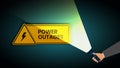 Power outage, warning poster in yellow a triangular icon of electricity and hand with flashlight