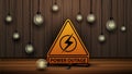 Power outage, yellow warning logo on the background of wooden wall and dull light bulbs