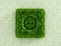 Power outlet covered with grass Royalty Free Stock Photo