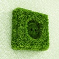 Power outlet covered with grass Royalty Free Stock Photo