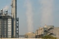 Power plant on blue sky. Chimney of thermal power plants.