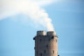 Power plant chimney with smokes Royalty Free Stock Photo