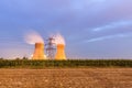 Power plant on farmland at night Royalty Free Stock Photo