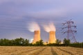 Power plant on farmland at night Royalty Free Stock Photo