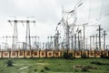 Power plant with high voltage electric posts in the sideway of the road to Varanasi, India