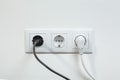 Power plugs plugged in a electric socket Royalty Free Stock Photo