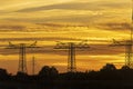 Power poles in Germany at sunset Royalty Free Stock Photo