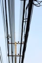 Power poles and many telephone lines. Royalty Free Stock Photo