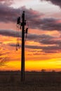 Power pylon with broken lines in the dusk Royalty Free Stock Photo