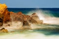 Power of sea surf, stormy water sprays high on cliff in windy summer day. Limnos Royalty Free Stock Photo