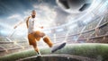 Power soccer kick. A soccer player kicks the ball in stadium. Professional soccer player in action. Wide angle. 3d Royalty Free Stock Photo