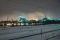 Power station with steam cloud blown by the wind Royalty Free Stock Photo