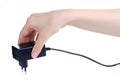 Power Supply ac to dc adapter in hand Royalty Free Stock Photo