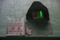 Power supply room indicator lights with sign stated `Danger` from the language of Malay, English, Chinese, Punjabi & Tamil