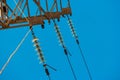 Power tower detail with three row od glass insulators and the wires Royalty Free Stock Photo