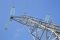 Power tower and transmission lines on blue background Royalty Free Stock Photo