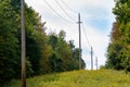 Power Transmission lines cut through a forest Royalty Free Stock Photo