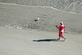 Power walking on beach Royalty Free Stock Photo