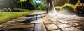 Power Washing Garden Cobble Stone Paths. Outdoor Cleaning Using Pressure Washer. Closeup Photo. Royalty Free Stock Photo