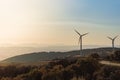 Power of wind turbine generating electricity clean energy with blue background on the sky.Global ecology.Clean energy concept save Royalty Free Stock Photo