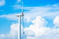 Power of wind turbine generating electricity clean energy with cloud background on the blue sky.Global ecology.Clean energy Royalty Free Stock Photo