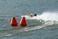 Powerboat rounding a marker buoy in a Powerboat competition Royalty Free Stock Photo