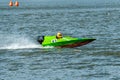 Powerboat with number 83 go fast along the lake Royalty Free Stock Photo