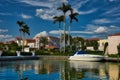 Powerboat parked in front of a home