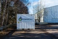 PowerCell fuel cell system container in a parking lot..