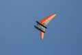 Powered hang glider, para glider. sail flying object on beautiful blue sky