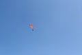 Powered paragliding - paraglider with red parachute Royalty Free Stock Photo