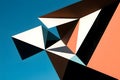 A powerful, abstract 3D render of a complex geometric structure composed of multiple intersecting triangular planes Royalty Free Stock Photo