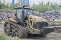 Powerful agricultural crawler tractor on Bizon Track Show