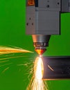 High-Precision Laser Cutting Metal with Sparks Royalty Free Stock Photo