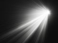 Powerful Beam of Light Shining Through Dark Background Royalty Free Stock Photo