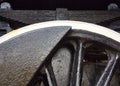 Close up detail of a steam locomotive drive wheels and leaf spring