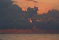 Powerful clouds at sunset in the sea 006