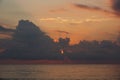 Powerful clouds at sunset in the sea 005