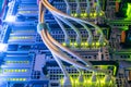 Powerful computer equipment of a modern data center is in the server room. High-speed internet connection. Many wires connect to Royalty Free Stock Photo
