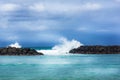 Waves Crash on Shoreline Rock