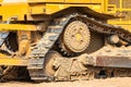 Powerful crawler bulldozer close-up at the construction site. Construction equipment for moving large volumes of soil. Modern