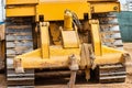 Powerful crawler bulldozer close-up at the construction site. Construction equipment for moving large volumes of soil. Modern Royalty Free Stock Photo