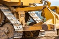 Powerful crawler bulldozer close-up at the construction site. Construction equipment for moving large volumes of soil. Modern