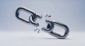 A metallic chain link is dramatically broken in half Royalty Free Stock Photo