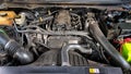 A diesel engine bay, showcasing mechanical complex hoses, and pipes Royalty Free Stock Photo
