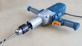 Powerful drill with reduced rpm for large-diameter holes and for mixer, professional tool