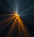 Abstract Burst of Glowing Orange and Blue Light Rays in Motion against Dark Background Royalty Free Stock Photo