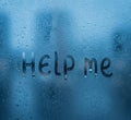 Silent Cry: Help Me Written on a Fogged Window Royalty Free Stock Photo