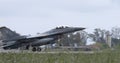 Fighter Jet Landing in Rain with Impressive Water Splashes