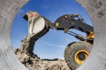 Powerful front wheel loader or bulldozer working on a quarry or construction site. earthworks in construction. Powerful modern Royalty Free Stock Photo